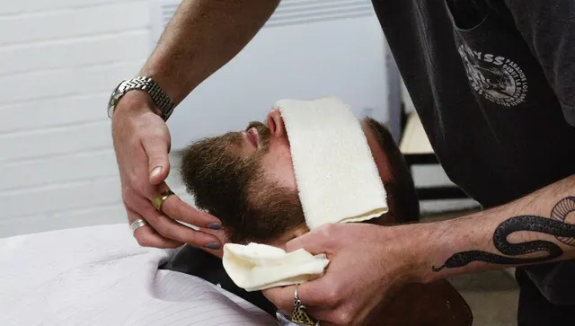 A hot towel at Bloodhound Barbering